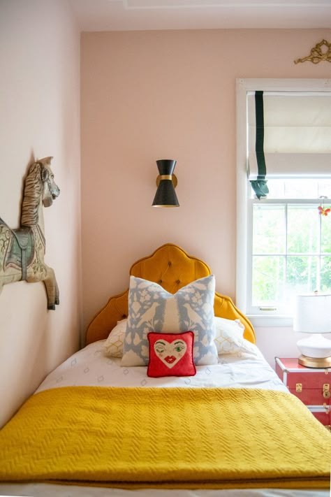 Little girls vintage modern bedroom by Hausmatter Interiors. #pinkandyellow #tuftedheadboard #sconceoverbed #romanshade Wes Anderson Room, Girly Interior, Girls Bedroom Vintage, Mustard Bedroom, Vintage Girls Rooms, Eclectic Kids Room, Vintage Kids Room, Posters On Wall Bedroom, Background Bedroom