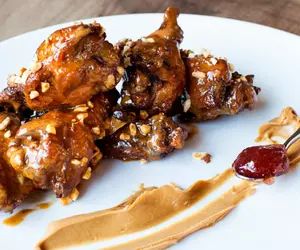 Peanut Butter And Jelly Wings Recipe, Asian Wings, Peanut Butter Chicken, Nrg Stadium, Wholesome Snacks, Wings Recipe, Winner Winner Chicken Dinner, Peanut Butter And Jelly, James Beard