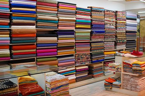 Beautiful fabric in India Fabric Shop Interior Design, Fabric Store Design Interior, Fabric Shop Interior, Textile Shop Interior Design, Online Fabric Store In India, Fabric Shop Display, African Fabric Store, Fabric Store Displays, Sewing Kit Bag