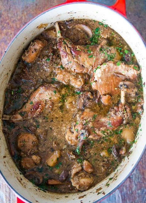 Rabbit Stew with Mushrooms ~ Hearty rabbit stew with fresh and dried mushrooms, parsnips, garlic, shallots, and sherry. ~ SimplyRecipes.com Stew With Mushrooms, Rabbit Stew, Rabbit Dishes, Dried Porcini Mushrooms, Wild Game Recipes, Dried Mushrooms, Rabbit Food, Hearty Stews, Game Food