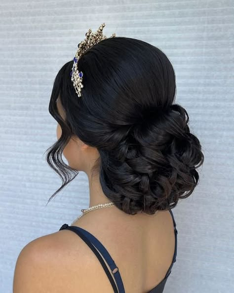 Regal Crown Hairstyles to Inspire You Quinceanera Hair Updo, Updo Quince Hairstyles, Sweet 16 Updo Hairstyles With Tiara, Hair Updos For Quinceanera, 15 Hair Quinceanera Bun, Quinceanera Hairstyles Bun With Curls, Hair Up Quinceanera Hairstyles, Low Bun Quince Hairstyles, Quinceanera Hairstyles Updo Buns