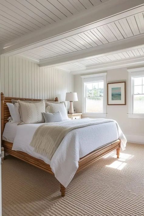 Create a serene and coastal retreat in your home with these 25 Charming Cape Cod Bedroom Ideas. Each idea captures the essence of this classic American style, blending nautical charm with cozy, understated elegance. Discover how to use light, airy color palettes, natural textures, and maritime accents to transform your bedroom into a peaceful Cape Cod haven. Whether it's through breezy linens, weathered wood furniture, or seaside-inspired decor! Cape Cod House Bedroom, Cape Cod Bedroom Ideas Sloped Ceiling, Cape Cod Bedroom Ideas, Cape Interior, Weathered Wood Furniture, Cape Cod Bedroom, Cape Cod Interior Design, Cape Cod Decor, Interior Design Curtains