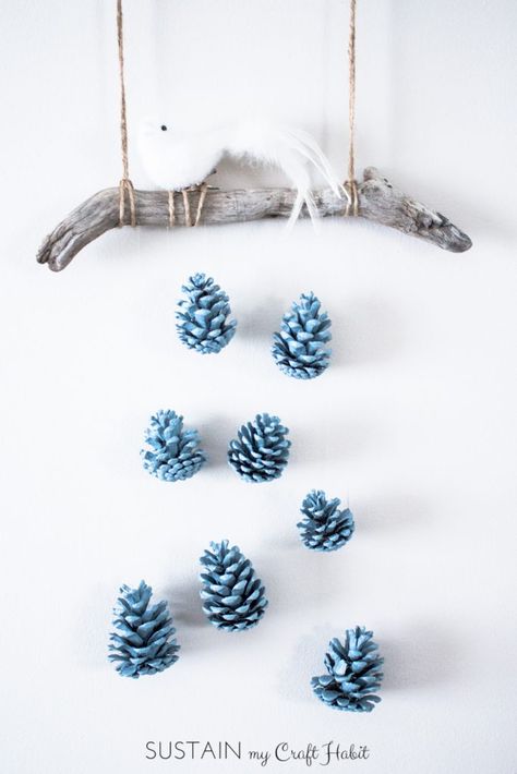 A beautiful bird perched above a cascading array of robin's egg blue pinecones makes a beautiful, inexpensive and easy rustic DIY wall art idea. Check out the detailed step-by-step tutorial. Rustic Wall Decor Diy, Wall Art Idea, Pinecone Crafts Christmas, Candy Corn Decorations, Painted Pinecones, Cone Crafts, Rustic Wall Hangings, Diy Pinecone, Diy Wand