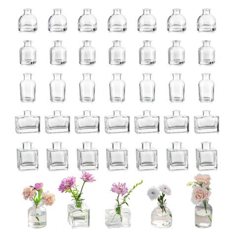 PRICES MAY VARY. 【Thick & Sturdy】-- Made of thickened pressed glass, these small glass bud vases in bulk are sturdy and not easily broken. Our single flower vase is thicker and sturdier than others. 【Dainty & Beautiful】-- Each mini glass vase for centerpieces is great for a single short stem flower or two small flowers. They look great grouped and elegant. These sturdy cute bottle vases can also stand alone to decorate your room even though without flowers. 【Widely Used】-- The small flower vases Bud Vase Centerpiece, Vases For Centerpieces, Bridal Shower Table, Glass Vases Centerpieces, Glass Bud Vases, Reed Diffuser Sticks, Gifts Table, Decor Birthday Party, Short Vase