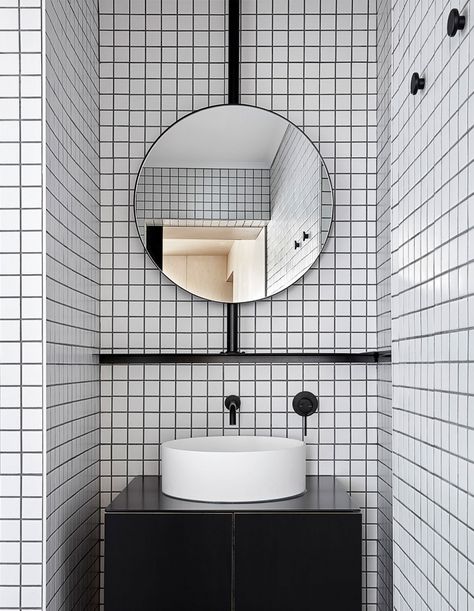 Micro-Luxe Strikes Again White Tiled Bathroom, Future Bathroom, Plywood Storage, Tiled Bathroom, Subway Tile Showers, Black Grout, Laminate Cabinets, Micro Apartment, Apartment Renovation