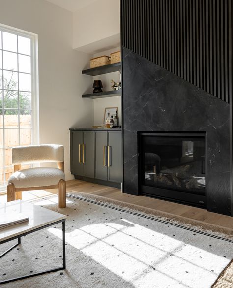 "There are two things that make a room timeless: a sense of history and a piece of the future." -Charlotte Moss⁠ ⁠ We are always designing for YOU. 🖤⁠ ⁠ #micahandco #timelesswithanedge⁠ Fireplace 2 Story, Fireplace Plaster, Mcm Fireplace, High Fireplace, Two Story Fireplace, House Fireplace, Basement Decoration, Charlotte Moss, Fireplace Mantle Decor