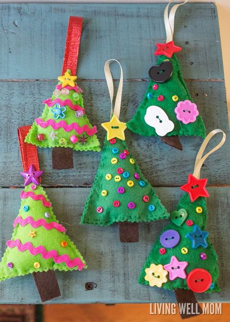 Felt Christmas Tree Ornaments are a perfect first sewing project for kids as young as 4 years. Easy to make, this craft can be customized and enjoyed all the way up to adults! Felt Christmas Tree Ornaments, Christmas Tree Ornaments Felt, Christmas Tree Ornament Crafts, Sewing Felt, Felt Ornaments Diy, Felt Christmas Tree Decorations, Christmas Sewing Projects, Felt Crafts Christmas, Felt Christmas Decorations