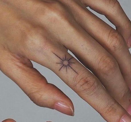 Small Sun Tattoo Finger, Sun On Finger Tattoo, Sunburst Finger Tattoo, Cute Thumb Tattoos, Compass Tattoo Finger, Sunshine Finger Tattoo, Sun Finger Tattoos For Women, Sun Tattoo On Finger, Celestial Finger Tattoo