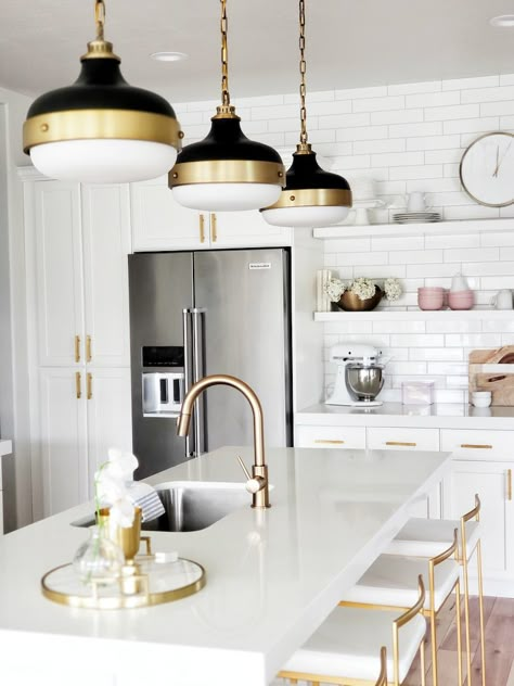 #whitelanedecor @whitelanedeco Build.com #ad Feiss Candence Pendant, brass black and white kitchen, Delta Trinsic Faucet, open shelving with subway tile, brass par pull and with white cabinets, Fuji gold barstool Rich House, Fridge Wall, Delta Trinsic, Metal Barn, Building Homes, White Kitchen Design, Barn Homes, Gold Kitchen, 아파트 인테리어