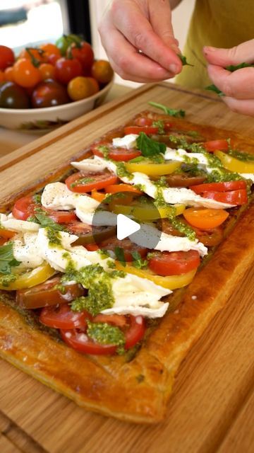 Emma Bridgewater on Instagram: "🍅 This beautiful summer tart is almost too easy to make. All you need is a sheet of puff pastry, sweet @iowtomatoes heirloom tomatoes, creamy buffalo mozzarella and fresh basil from @abelandcole  🍃 Serve this tart on @emma_bridgewater’s beautiful vegetable garden inspired plates. It’s the perfect meal to share with friends on warm, sunny days.  Caprese Tomato Tart Serves 4-6 320g sheet ready-rolled puff pastry 1 egg 500g heirloom tomatoes 3 tbsp pesto 200g mozzarella di bufala A handful of basil  Heat your oven to 200°C/Fan 180°C/Gas 6.   Unroll your sheet of pastry and leave it on top of the paper it came wrapped it. Lay it on a baking tray. Use a small, sharp knife to score a 2cm-wide border around the edge of the tart, then prick the centre of the tart Puff Pastry Vegetable Tart, Beautiful Vegetable Garden, Summer Tart, Heirloom Tomato Tart, Tomatoes And Mozzarella, Vegetable Tart, Puff Pastry Tart, Buffalo Mozzarella, Tomato Tart