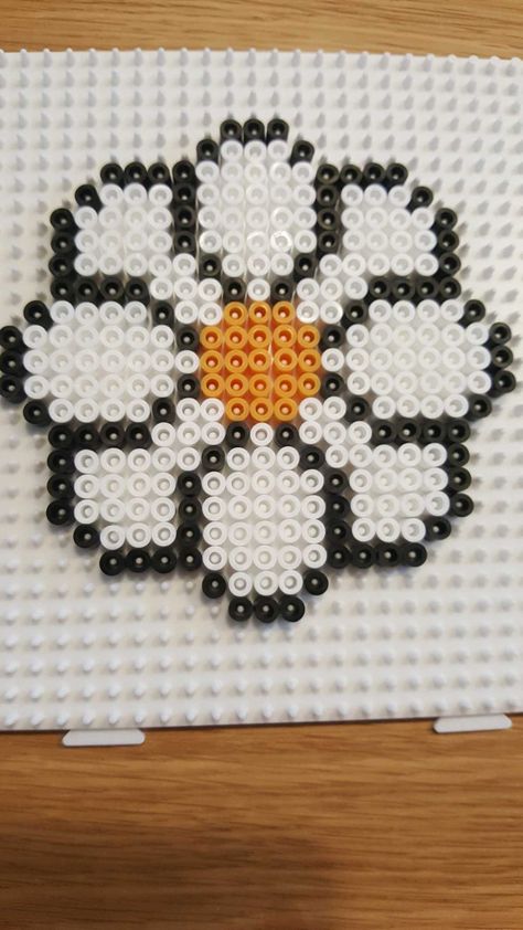 Hama bead flower. Perler Beads Ideas Flowers, Flower Melty Beads, Flower Perler Bead Pattern, Daisy Perler Bead Pattern, Fused Bead Art, Flower Iron Beads, Hama Bead Flowers, Perler Beads Flower Pattern, Peeler Bead Flower