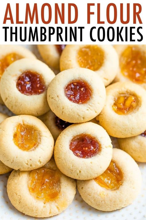 These easy and healthy almond flour thumbprint cookies are made with just six simple ingredients. They're festive and perfect for the holidays. #thumbprintcookies #holidaycookies #christmascookies #vegan #glutenfree #almondflour #eatingbirdfood Almond Flour Cookies Recipes, Almond Flour Thumbprint Cookies, Gluten Free Thumbprint Cookies, Homemade Fig Jam, Amaretti Cookie Recipe, Almond Flour Desserts, Almond Flour Recipes Cookies, Cookies Recipes Easy, Gluten Free Paleo Recipes