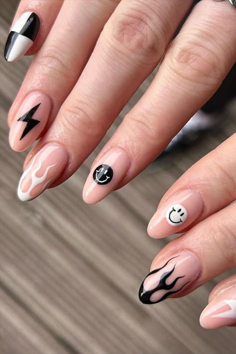 Get ready to express your playful side with this fun and cute black and white nail set by @illustrated_nails, featuring smiley faces, fiery flames, thunderbolts, and checkerboard patterns, adding a touch of whimsy and personality to your manicure that’s sure to bring smiles all around. Craving a nail makeover? Your journey begins at nailustrous.com! Dive into our article for a wealth of captivating nail art ideas and transform your nails into works of art! White Manicure Designs, White Nail Set, White Nail Art Ideas, Tiffany Nails, Cowboy Nails, Black And White Nail, Black And White Nail Art, Nail Art For Kids, White Nail Art