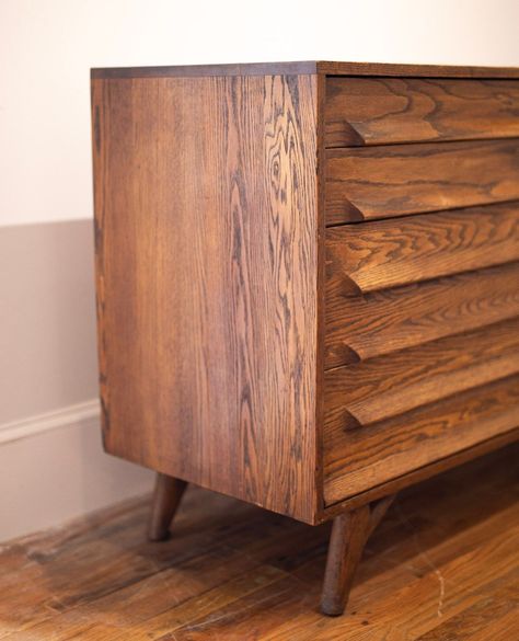 Experience Mid-Century Modern sophistication with the iconic designer Jack Van Der Molen's Solid Wood 8-Drawer Lowboy Dresser. Crafted with solid wood and featuring a beautifully designed symmetrical front face with carved drawer pulls. Let the floating leg detail elevate your décor. (Minor color-matched marking on dresser top, but hey, adds character, right?!)⁠ ⁠ DM for dimensions and additional info! Available for in-store pickup or shipping/delivery nationwide, link in bio for info ♥️⁠ .⁠ ... Lowboy Dresser, Dresser Top, Front Face, Drawer Pulls, Color Matching, Icon Design, Century Modern, Link In Bio, Mid-century Modern