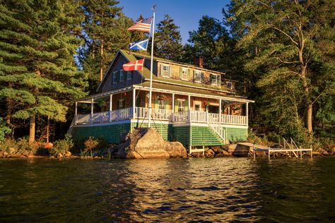 Perched on the shore of a pond on Maine’s Blue Hill Peninsula, a family cottage holds a century of memories. Carriage House Apartments, White House Tour, Lakeside Cottage, Blue Hill, Summer Cottage, Roof Shingles, Maine House, Summer House, Old Houses