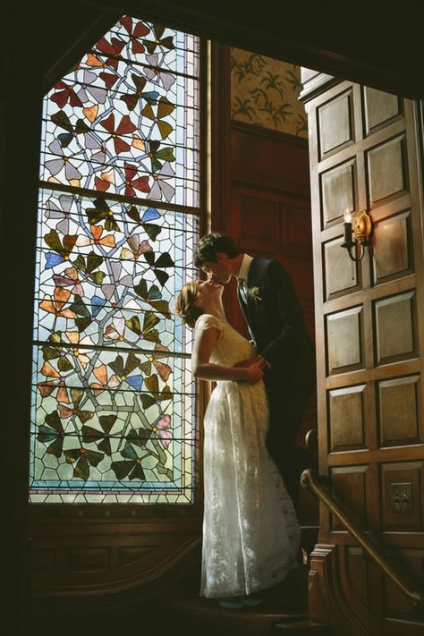 Victorian Aesthetic Wedding, Stained Glass Photoshoot, Wedding Photography Vintage, Stained Glass Window Photoshoot, Stained Glass Wedding, Stained Glass Window Wedding, Stained Glass Bride And Groom, Old Building Wedding Photography, Bride Looking Out Window