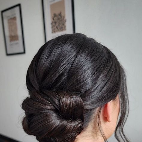 Low Bun Wedding Hair Dark Hair, Wedding Bun Black Hair, Low Bun Hairstyles Elegant, Messy Low Bun Bridal Hair, Low Bun With Two Strands Out, Low Bun Bridal Hairstyles, Mid High Bun Wedding Hair, Bridal Low Bun Hairstyles, Bun Hairstyles Bridal