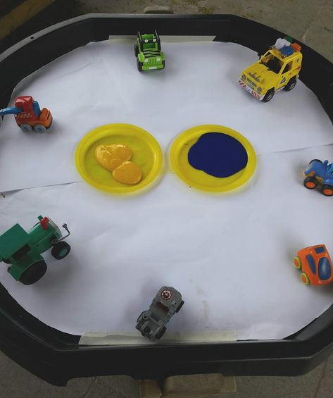 Simple markmaking with tyres in paint Simple Tough Tray Ideas, Tuff Tray Ideas For Under 2s, Cars Tuff Tray Ideas, Car Wash Tuff Tray Eyfs, Tuff Tray Reception, Occupation Tuff Tray, Vehicles Tuff Tray, Home Corner Ideas Early Years, Tuff Tray Ideas Toddlers