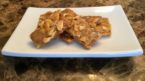 Indulge in homemade salted almond graham cracker brittle anytime: a fun, easy treat that balances chewy with crunchy and sweet with savory. Graham Cracker Almond Toffee, Almond Graham Cracker Brittle, Graham Cracker Almond Bark, Squares Recipes, Peanut Brittle Recipe, Almond Brittle, Graham Cracker Cookies, Cracker Toffee, Brittle Recipes