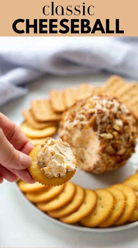 A cheeseball surrounded by crackers, an easy and crowd-pleasing Thanksgiving appetizer. Italian Cheese Ball Recipes, Homemade Cheeseball Recipe, Cheese Ball Without Nuts Recipes, Small Cheese Balls, Simple Cheese Ball Recipe, Sharp Cheddar Cheese Ball, Recipe For Cheese Ball, Easy Cheese Ball Recipes 3 Ingredients, Cheese Ball Charcuterie Board