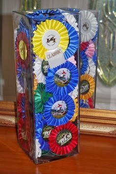 If you've got old horse show ribbons collecting dust in the basement, then these DIY ideas are for you! Not only do they make a great conversation piece, but they often hold sentimental value and are a reminder of wonderful memories. Don't let that go to waste. Display Horse Show Ribbons, Diy Equestrian, Horse Ribbon Display, Show Ribbon Display, Clogged Ears, Horse Show Ribbons, Horse Ribbons, Ribbon Display, Saddle Rack