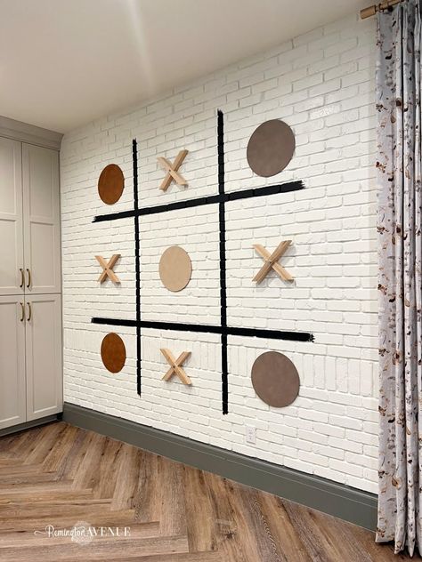 Interactive Art Wall Office, Vintage Industrial Game Room, Giant Wall Games, Apartment Clubhouse Design Interiors, Teen Center Ideas, Interactive Wall Design, Game Room Paint Ideas, Giant Tic Tac Toe, Small Game Room Ideas