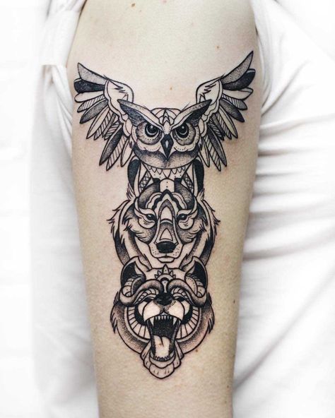 Animal spirit totem tattoo by Sasha Kiseleva inked on the right arm Totem Pole Tattoo, Pole Tattoo, Spirit Animal Tattoo, Totem Tattoo, Serpent Tattoo, Native Tattoos, Tattoo Prices, Animal Spirit, Greek Tattoos