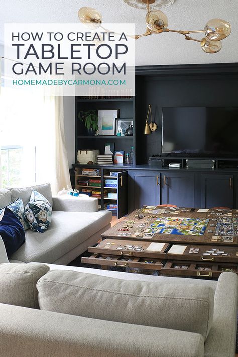 Create a stunning DIY game room complete with tons of closed storage, a built gaming coffee table, and more! | Home Made by Carmona | #gameroom #tabletopgames #gamerstable #coffeetable #builtins #livingroom #blackwalls #smalllivingroom Ultimate Gaming Room, Board Game Room, Board Game Storage, Puzzle Table, Game Room Family, Gaming Room Setup, Room Deco, Diy Coffee Table, Gamer Room