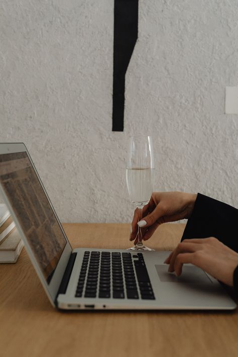 A laptop on a cozy desk with a glass of wine, creating a work-from-home atmosphere. Laptop Photography, Laptop Aesthetic, Classy Aesthetic, Glass Of Wine, Work Life Balance, Free Stock Photos, Working From Home, Stock Images Free, Laptop