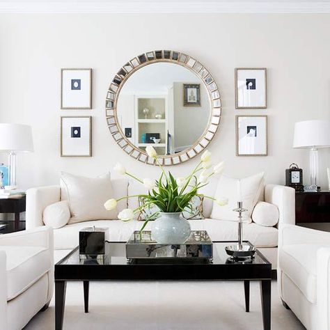 Character in Contrast - Strong contrast of light and dark keeps this monochromatic living room interesting. Mirror On The Wall, Alkaline Diet, White Living, White Living Room, Living Room Mirrors, White Furniture, Round Mirror, Design Living Room, A Living Room