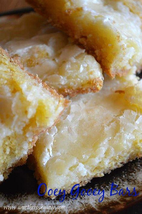 Ooey Gooey Bars Ooey Gooey Lemon Bars, Delta Bars Recipe, Yellow Cake Bars, Lemon Gooey Bars, Obey Gooey Bars, Oort Gooey Bars, Poet Gooey Bars, Ooy Gooy Bars, 9x9 Dessert Recipes