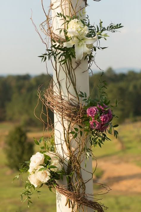 The patio at Autumn Ridge lends itself perfectly to ceremonies, & the owners have installed a wonderful arbor that we decorated with grapevine, curly willow branches, Italian Ruscus, & bouquets of flowers in the wedding colors.  The flowers on the arbor included cream garden roses, cool water roses (lavender), white hydrangea, white oriental lilies, & Vendela roses | by Dorothy McDaniel's Flower Market; Unplugged Photography Branch Arch Wedding, Vendela Roses, Wedding Columns, Italian Ruscus, Curly Willow, Wedding Arches, White Hydrangea, Close Image, Wedding Deco