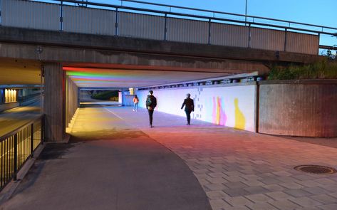 A busy tunnel beneath railroad tracks in Eskilstuna, Sweden, ushers pedestrians, cyclists and motorists through the city. To increase the safety and appeal o... Exterior Lighting Design, Interactive Lighting, Under Bridge, Pedestrian Walk, Linear Park, Corridor Lighting, Interactive Walls, Pedestrian Street, Lighting Concepts