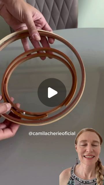 Thousands of Tips on Instagram: "Create a stunning and modern centerpiece with this unique DIY project! Start with wooden hoops of different sizes and secure them to a wooden base. Interlock the hoops to create a geometric design. Paint the piece in your favorite colors for a personalized touch. This eye-catching centerpiece will elevate any table setting and add a touch of sophistication to your home.”

Credits:@camilacherieoficial

#DIYcenterpiece
#homedecor
#diyhomedecor
#craftproject
#diyinspiration
#craftlove
#diyhome
#homesweethome
#crafttime
#diyenthusiast
Instagram Reels:

#reelsinstagram
#diyreels
#homedecorreels
#centerpieceideas
#easydiyreels
#quickdiyreels
#fundiyreels
#creativediyreels
#tabledecorreels
#homedecorinspiration
Centerpiece & Home Decor:

#centerpiece
#tabledecor
# Hoop Table Centerpiece Diy, Shower Rings Crafts, Diy Boho Centerpieces, Diy Dollar Tree Centerpieces, Dollar Tree Centerpieces, Boho Centerpiece, Personalized Centerpieces, Table Centerpieces Diy, Centerpiece Home