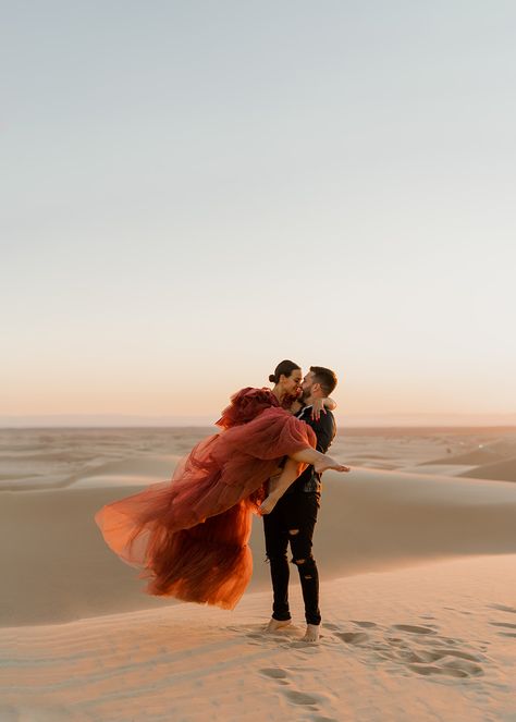 Engagement session of couple in the sand dunes Glamis Sand Dunes Engagement Photos, Sand Dunes Proposal, Egypt Engagement Photos, Glamis Engagement Photos, Sand Dune Wedding Pictures, Sand Dunes Elopement, Glamis Sand Dunes Photoshoot, Desert Wedding Photoshoot, Sand Dunes Wedding