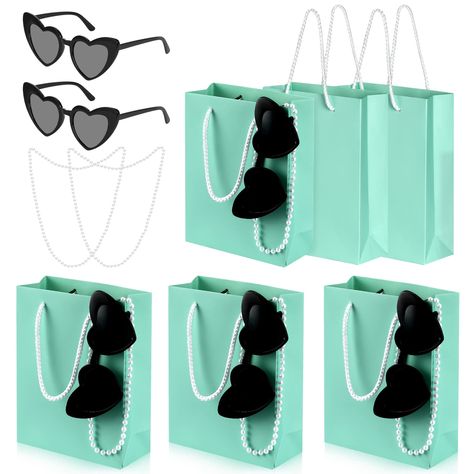 PRICES MAY VARY. 18 piece gift bag set：This value set comes with 6 Teal Blue Pieces paper party favor gift bags、6 Pieces white Pearl Necklace and 6 Pieces black Retro Heart Sunglasses.This set is perfect for parties and weddings, the pearl necklace and glasses add atmosphere and fun to the party. Size：The Teal Party Favor bags measures are 5.9x2.36x7.87inches,perfectly sized to hold party favors, candy, toys, goodies, treats and thank you gifts.The size of the pearl necklace is 6mm and the lengt Tiffany Blue Party Decorations, Tiffany Blue Party, Tiffany Themed Bridal Shower, Tiffany Birthday Party, Tiffany Birthday, Teal Party, Turquoise Party, Tiffany Bridal Shower, Tiffany's Bridal