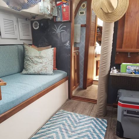 Updating your boat interior doesn't have to be expensive. 10 easy ways to update your sailboat interior including interior lights, boat interior upholstery ideas, and more. Boat Upgrades, Boat Interior Design, Yatch Boat, Boat House Interior, Portable Bathtub, Sailboat Interior, Sailboat Decor, Boat Crafts, Sailboat Living