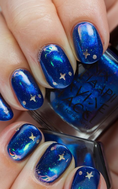 🌌💅 Dive into a universe of creativity with our royal blue nail polish collection! Inspired by the cosmos, each design captures the ethereal beauty of distant galaxies, featuring shimmering holographic accents that dance in the light. Let your nails be your canvas, blending nature's wonders and abstract artistry into a stellar expression of style. Elevate your nail game and shine like the stars! ✨🌟 #CosmicNails #NailArtMagic Blue Nails With Stars, Royal Blue Nail Polish, Cosmic Nails, Shine Like The Stars, Royal Blue Nails, Space Nails, Blue Nail Polish, Blue Nail, Nail Polish Collection