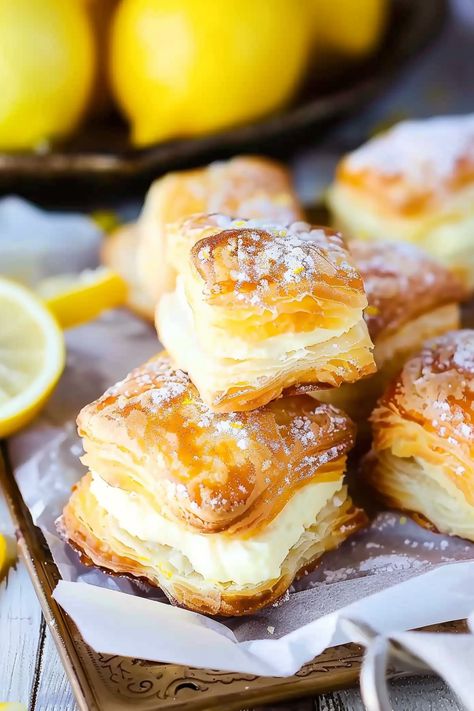 Lemon Cream Cheese Puff Pastries Lemon Puff Pastry, Amish Onion Fritters, Almond Tarts, Cream Cheese Puffs, Onion Fritters, Cream Cheese Puff Pastry, Puff Pastries, Cheese Puff, Lemon Cream Cheese