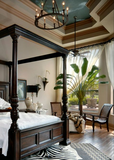 My Master has many similar features to this one...Poster Bed...Accent Colored Ceiling...Banana Tree...Zebra Rug...Pair of Chairs... British Colonial Bedroom, West Indies Decor, Colonial Bedroom, Zebra Rug, British Colonial Decor, Colonial Interior, Tropical Bedrooms, British Colonial Style, Colonial Design