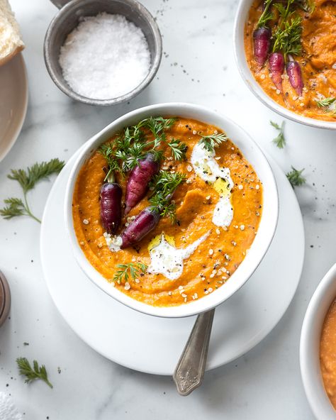 This creamy, nourishing leek and roasted carrot soup is bursting with flavor! And it's easy to make, and naturally vegan, and gluten-free. #roastedcarrotsoup #leekandcarrotsoup #carrotandtahinisoup #carrotleekspoup #carrotleeksouprecipe #wintersoups #vegansoup Roasted Carrot Soup, Roasted Leeks, Dairy Free Soup, Roasted Carrot, Mini Carrots, Leek Soup, Carrot Soup, Chopped Carrots, Winter Soups