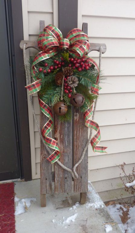 I bought the wooden sled but decorated it myself Christmas Sled Decoration, Christmas Chronicles, Sled Decor, Wooden Sled, Jul Diy, Christmas Lollipops, Christmas Sled, Dublin Airport, Christmas Porch Decor