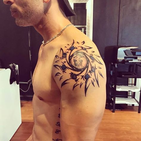 40 Sun Tattoo Ideas with Great Symbolic Meaning Traps Tattoo, Unique Sun Tattoo, Faith Tattoo Designs, Upper Shoulder Tattoo, Sun Tattoo Ideas, Small Arrow Tattoos, Leo Symbol, Hebrew Tattoo, Rare Tattoos