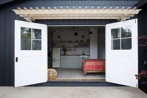 From Garage to Guest House: A Stylish ADU in LA by Allprace Properties House Flipper, Beveled Subway Tile, Flip House, House Flip, Backyard Cottage, House Flippers, Garage Studio, House Garage, Carriage Doors