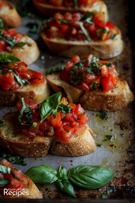 Classic Bruschetta is a traditional Italian appetizer that features toasted bread topped with a fresh mixture of tomatoes, garlic, basil, and olive oil. Tartufo Recipe, Italian Bruschetta Recipe, Italian Hot Chocolate Recipe, Classic Bruschetta, Tomato Bruschetta Recipe, Italian Bruschetta, Homemade Italian Meatballs, Italian Side Dishes, Italian Main Dishes