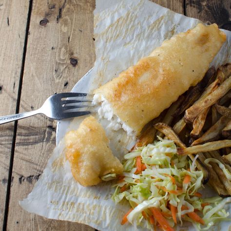 Tilapia makes a great substitute for cod in this healthful yet traditional-style fish and chips recipe with crunchy coleslaw. Easy Tilapia, Crunchy Coleslaw, Fish And Chips Recipe, Fish N Chips Recipe, Capers Recipe, Tilapia Fish, Veal Cutlet, Crab Dishes, Spicy Salsa