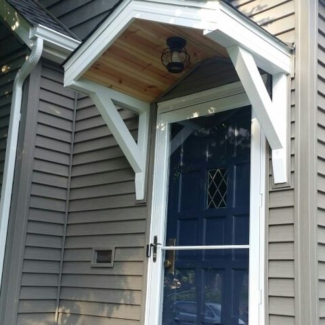 Doorway Overhang, Roof Over Door, Door Overhang Ideas, Porch Roof Ideas, Lake Cottage Exterior, Portico Entry, Front Door Overhang, Porch Overhang, Farmhouse Outdoor Lighting