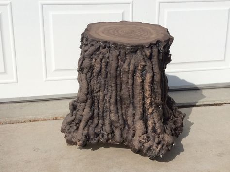 Faux Tree Stump stool (upside-down bucket covered with spray foam, topped with wooden board then painted and highlighted in browns.) Tree Stump Stool, Spray Foam Tree, Spray Foam Crafts, Stump Stool, Shrek Jr, Alice In Wonderland Decorations, Play Props, Decoration Vitrine, Tree Stumps