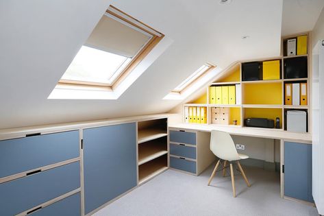 Bespoke fitted furniture, designed and installed under the eaves - maximum space and natural light to create this bright study space in a London home. Small Attic Room, Loft Conversion Bedroom, Attic Bedroom Storage, Eaves Storage, Attic Office, Attic Bedroom Designs, Loft Office, Loft Storage, Attic Room