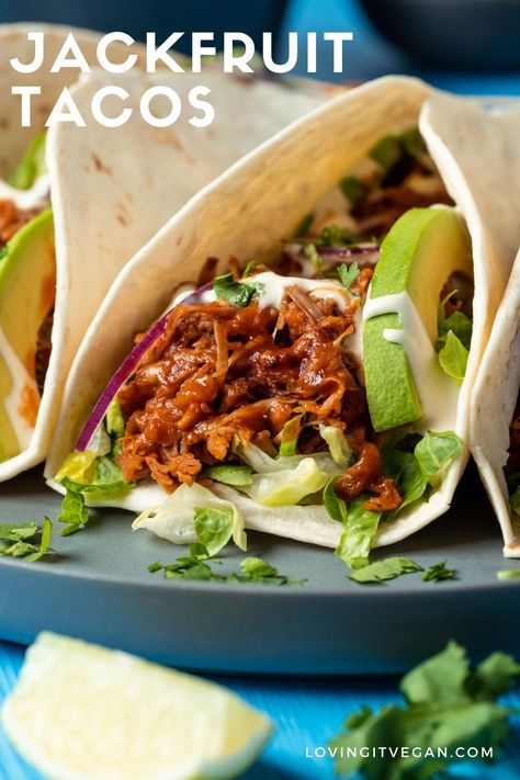 These vegan bbq pulled jackfruit tacos take taco night to the next level. The main attraction is the BBQ jackfruit; it's loaded with flavor with an amazing 'meaty' texture. Wrap it up in a taco with all the fixin's and you have a meal that everyone will love. | lovingitvegan.com Jackfruit Tacos Vegan, Bbq Pulled Jackfruit, Jackfruit Pulled Pork, Pulled Jackfruit, Vegan Tacos Meat, Vegan Jackfruit, Jackfruit Tacos, Vegan Barbecue, Bbq Jackfruit